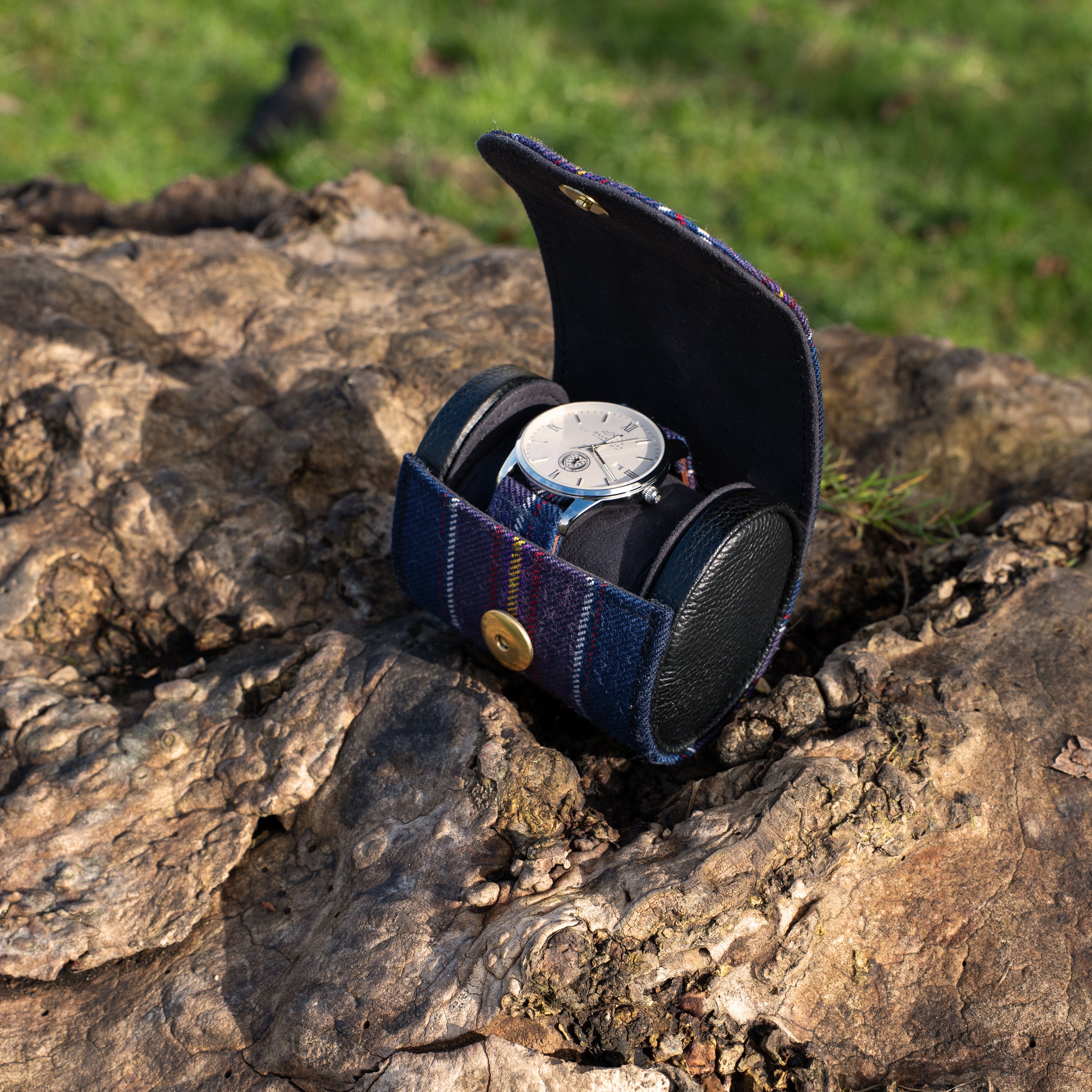 scotland national team tartan watch case with watch inside on a wood background